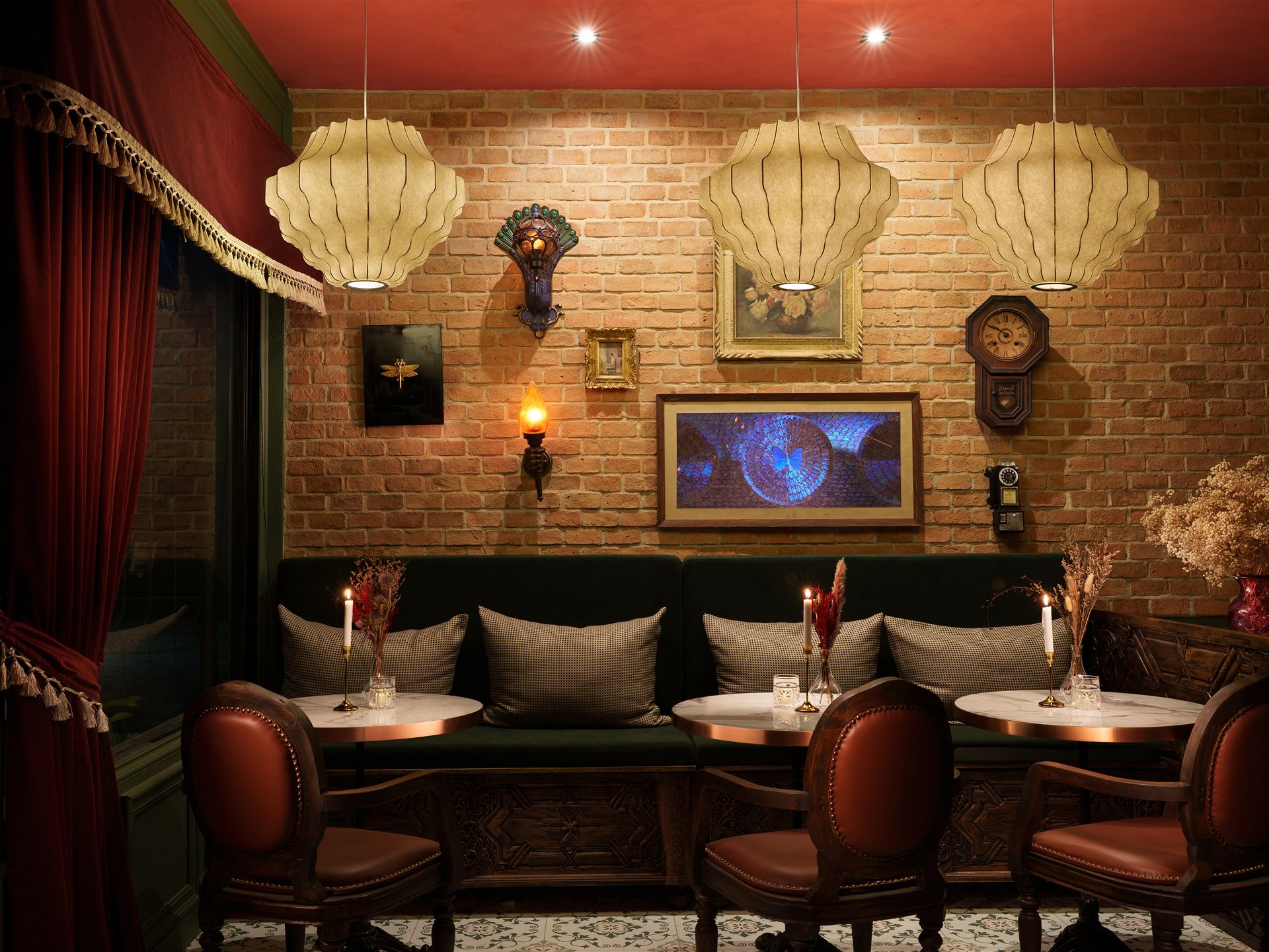 Crafty Coffee with green seating, brick walls and sculptural lights